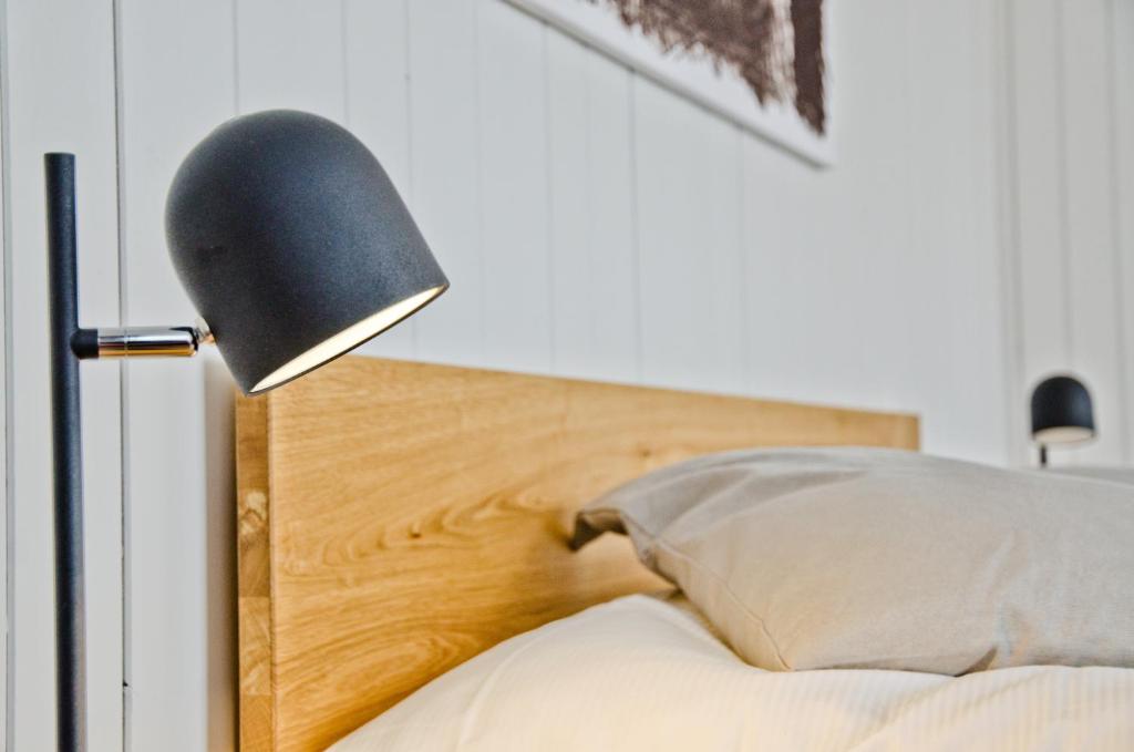Postel nebo postele na pokoji v ubytování Hotel Bären Guttannen