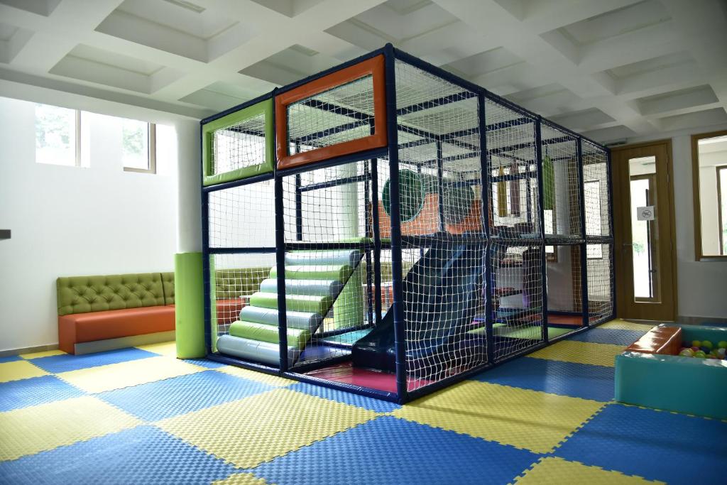 Postel nebo postele na pokoji v ubytování Miznah Hotels & Resorts
