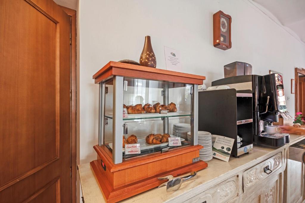 Kuchyň nebo kuchyňský kout v ubytování Albergo Rondò