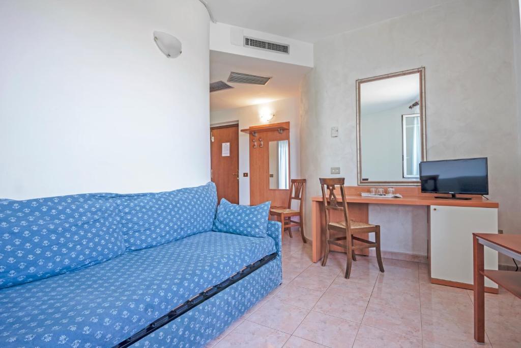 TV a/nebo společenská místnost v ubytování Albergo Rondò