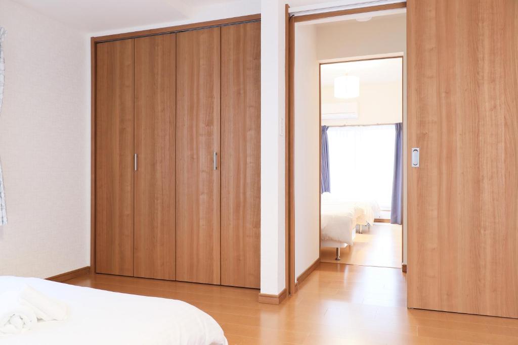 Voodi või voodid majutusasutuse Tokaichi inn 一軒家貸切 toas