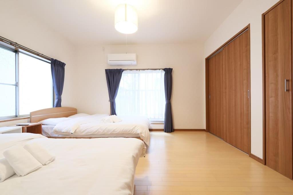 Voodi või voodid majutusasutuse Tokaichi inn 一軒家貸切 toas