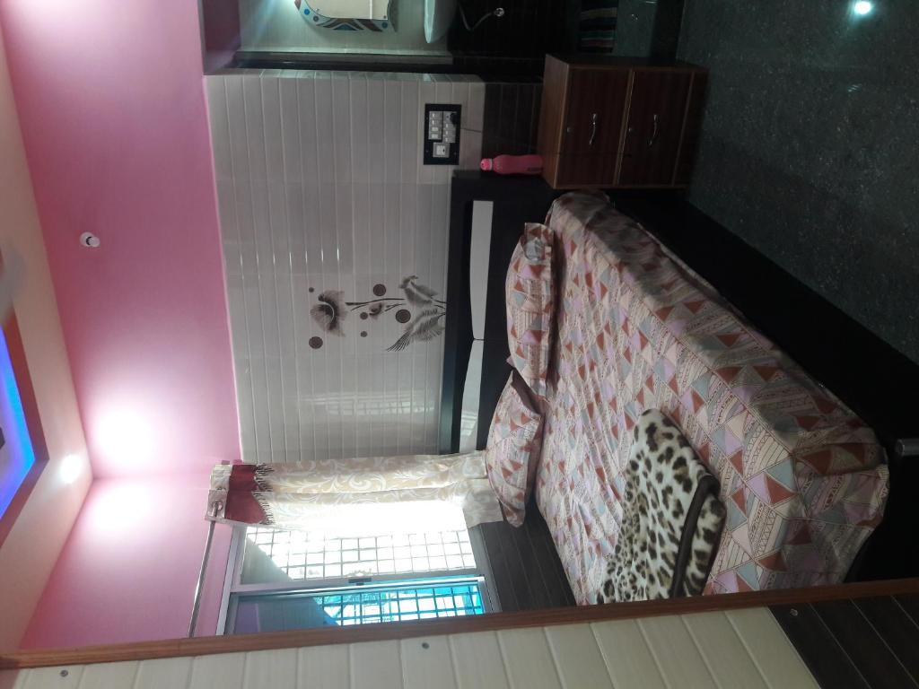 an overhead view of a bathroom with a shower at Rks Homestay in Hampi