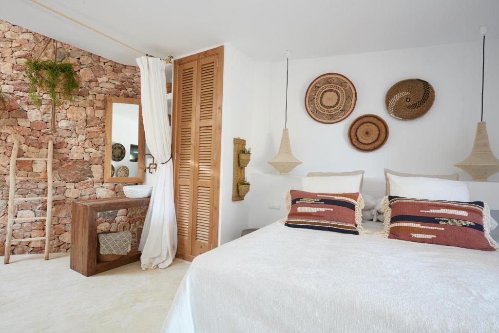 Postel nebo postele na pokoji v ubytování Can Tres Formentera