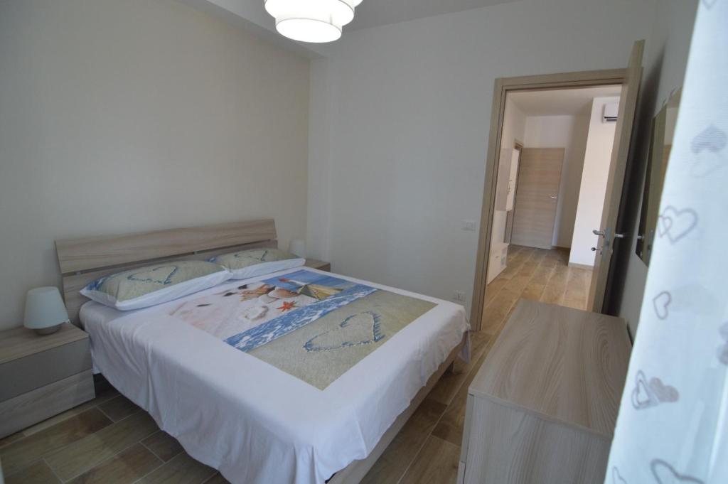 Łóżko lub łóżka w pokoju w obiekcie Triscele Casa Vacanze