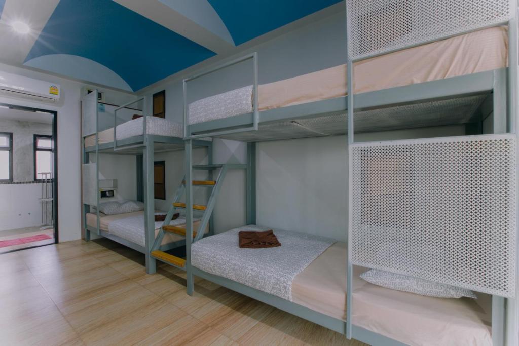 Postel nebo postele na pokoji v ubytování Good Dream Hotel (Khun Ying House)