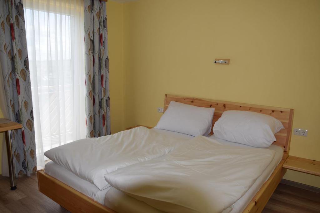 Postel nebo postele na pokoji v ubytování Der Schildbacherhof