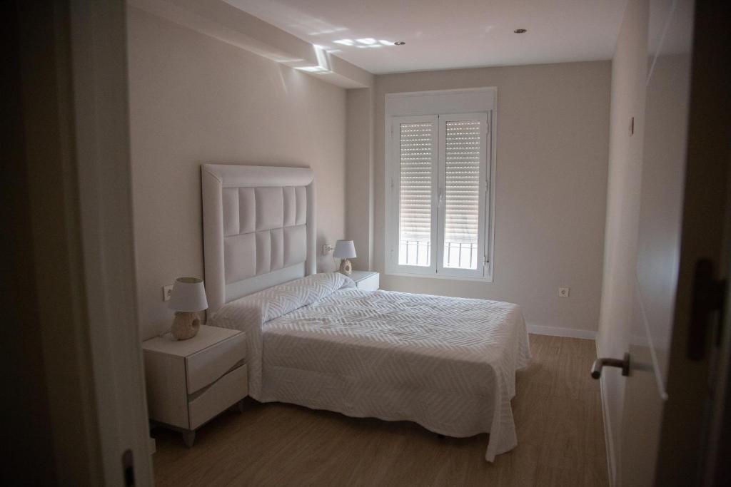 Posteľ alebo postele v izbe v ubytovaní Apartamento BellaVista