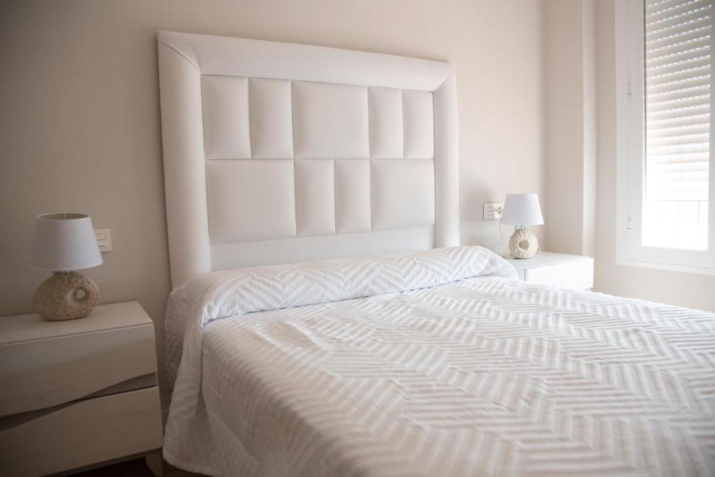 Posteľ alebo postele v izbe v ubytovaní Apartamento BellaVista