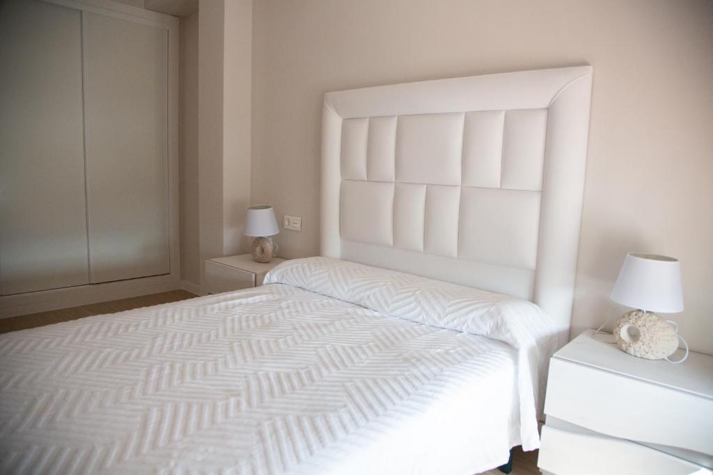 Posteľ alebo postele v izbe v ubytovaní Apartamento BellaVista