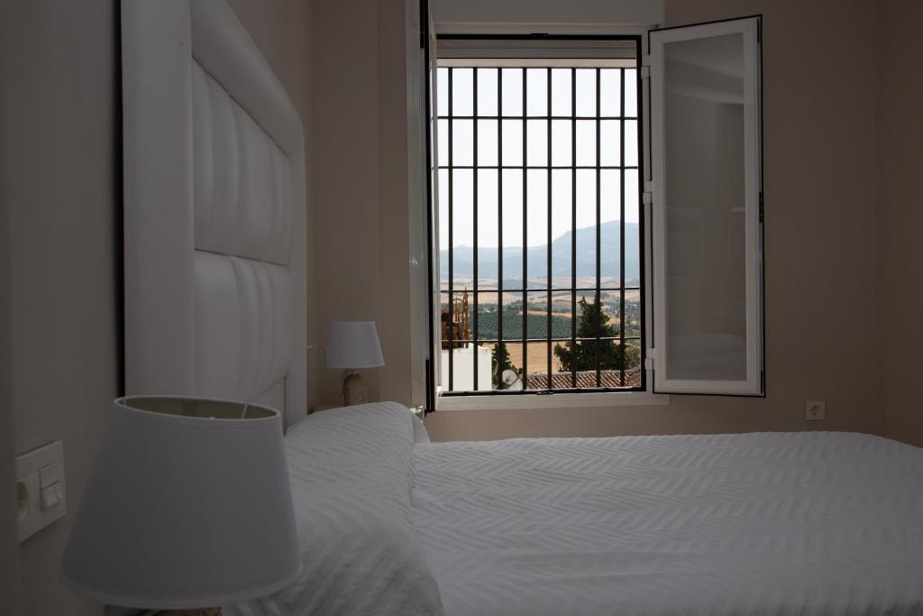 Posteľ alebo postele v izbe v ubytovaní Apartamento BellaVista