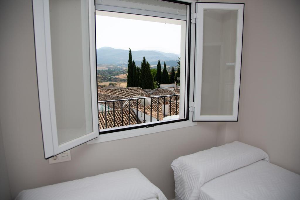 Posteľ alebo postele v izbe v ubytovaní Apartamento BellaVista