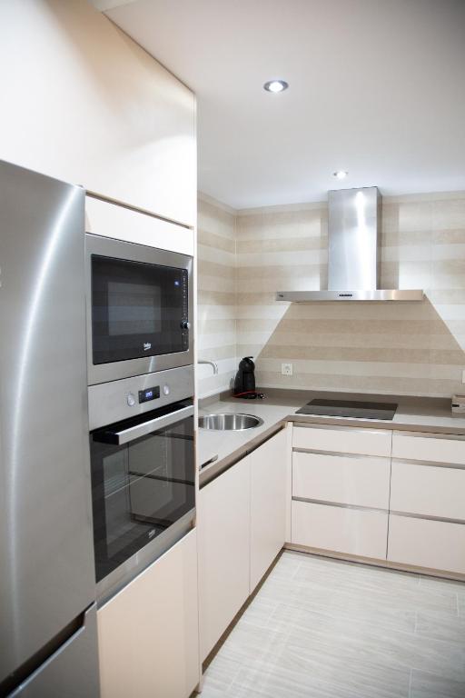 Kuchyňa alebo kuchynka v ubytovaní Apartamento BellaVista