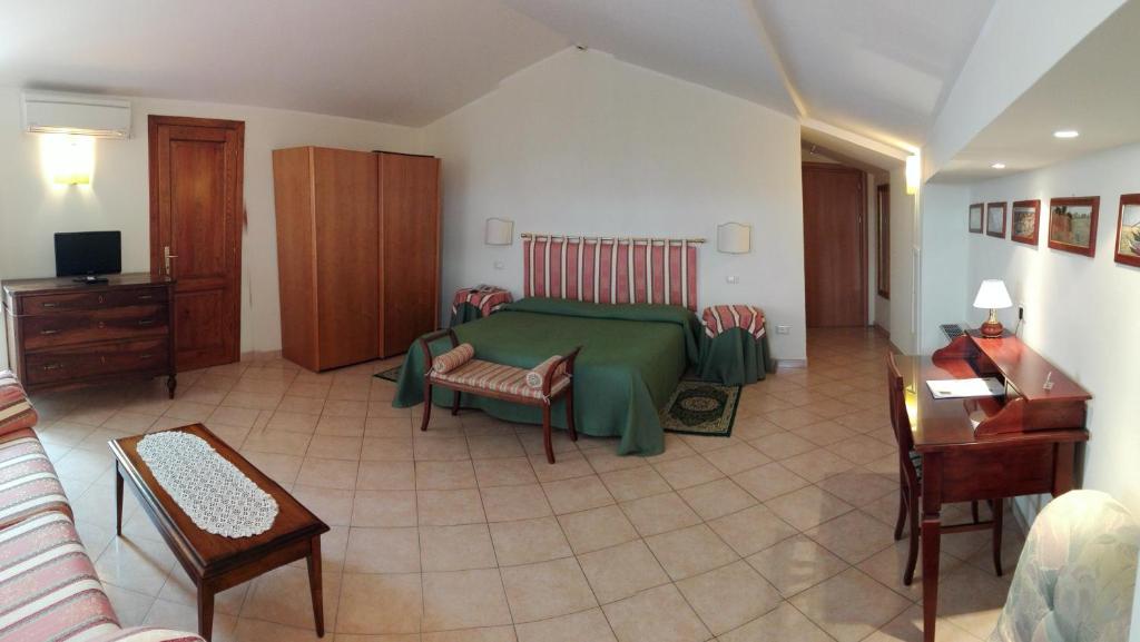 TV a/nebo společenská místnost v ubytování Hotel Umbra