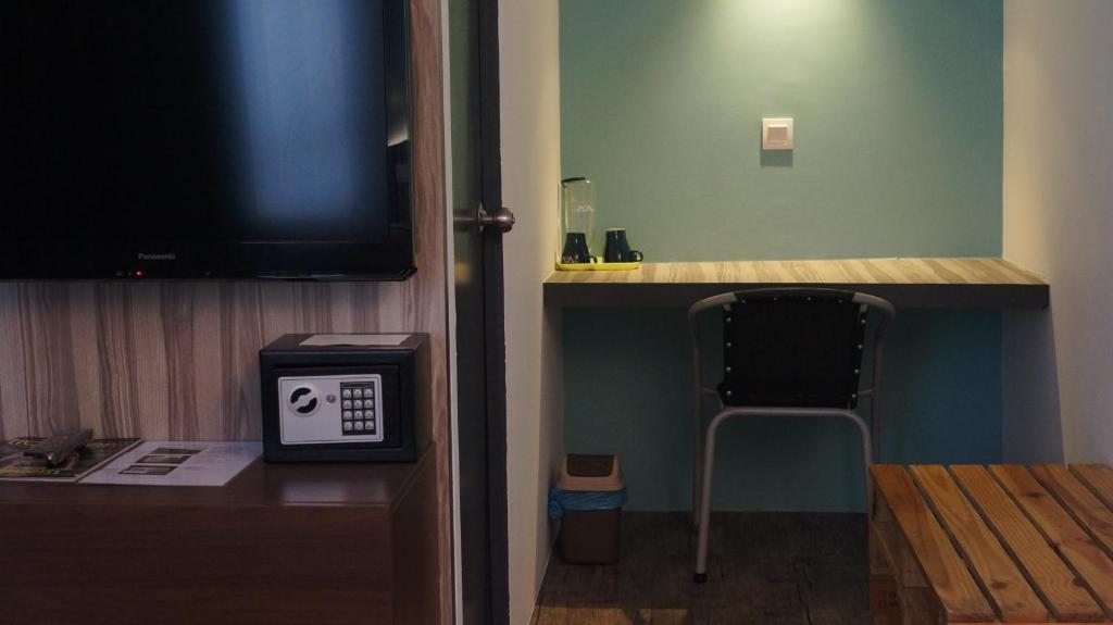 TV a/nebo společenská místnost v ubytování The Verve Hotel PJ Damansara