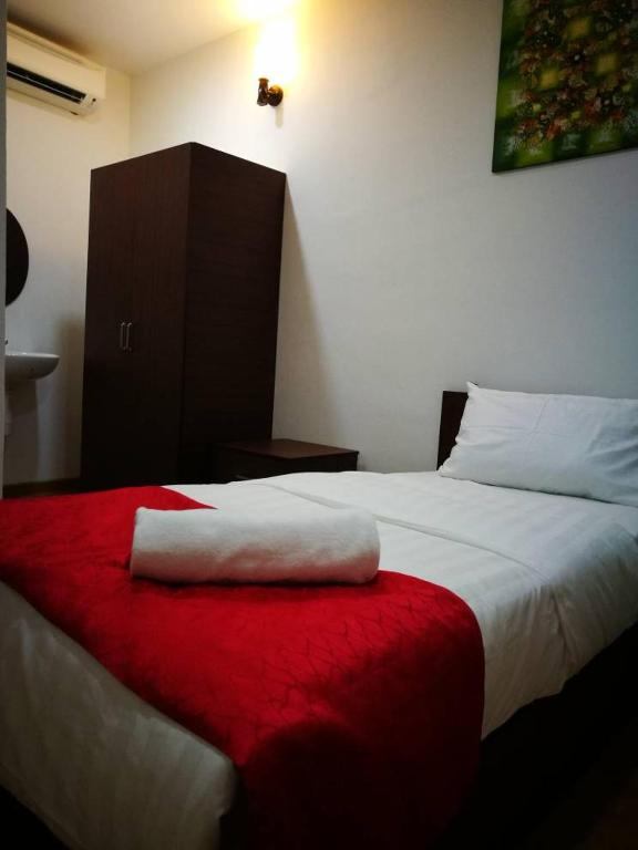 Postel nebo postele na pokoji v ubytování Hotel Mill Road