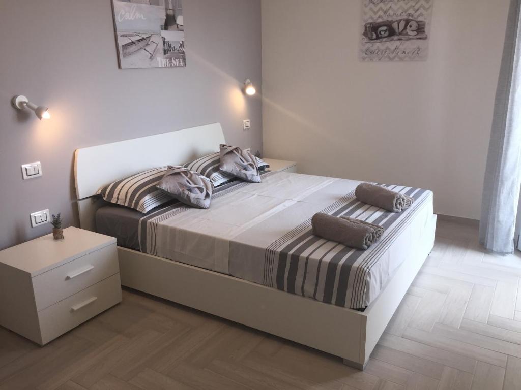 Katil atau katil-katil dalam bilik di Le Domus Modern Apartments Cagliari