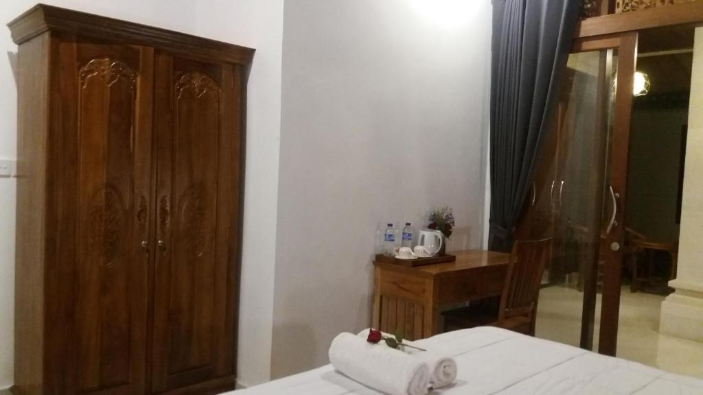 Postel nebo postele na pokoji v ubytování Cucu House