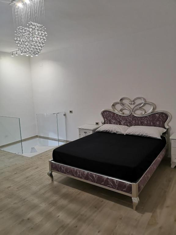 Postel nebo postele na pokoji v ubytování B&B Montemare