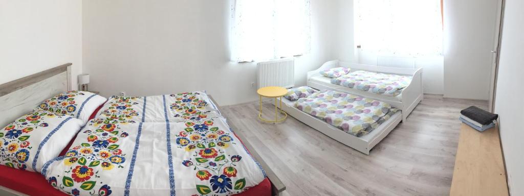 Posteľ alebo postele v izbe v ubytovaní U Pepíka