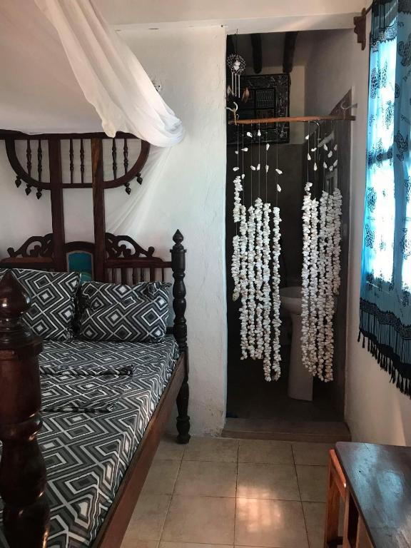 Postel nebo postele na pokoji v ubytování Vanilla House