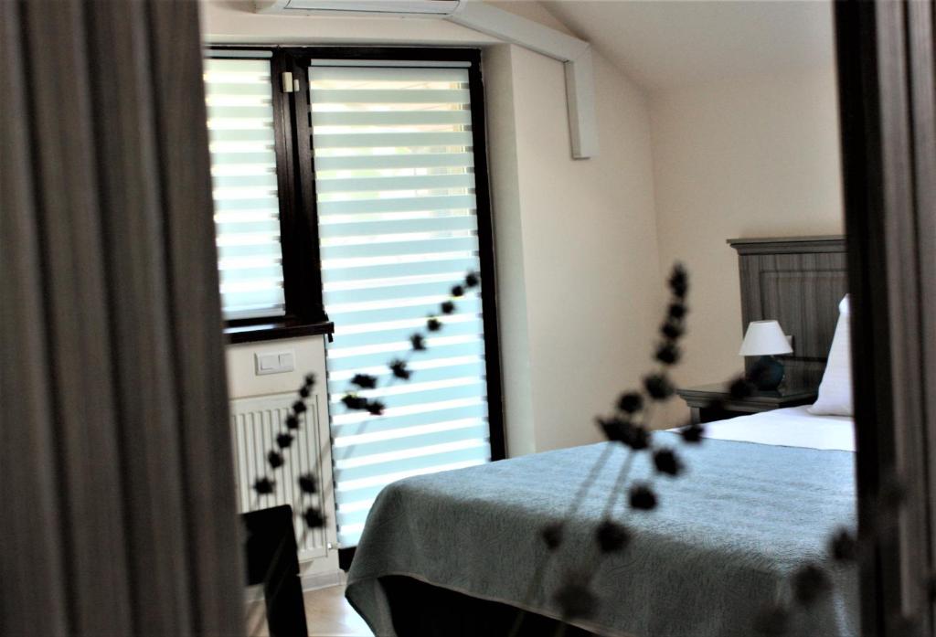 Postel nebo postele na pokoji v ubytování Silva House