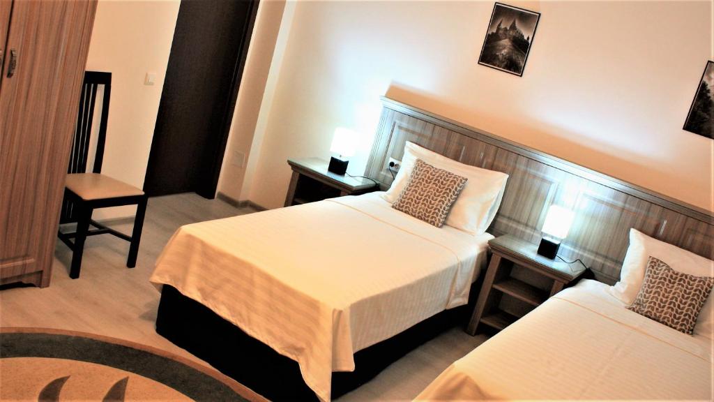 Postel nebo postele na pokoji v ubytování Silva House