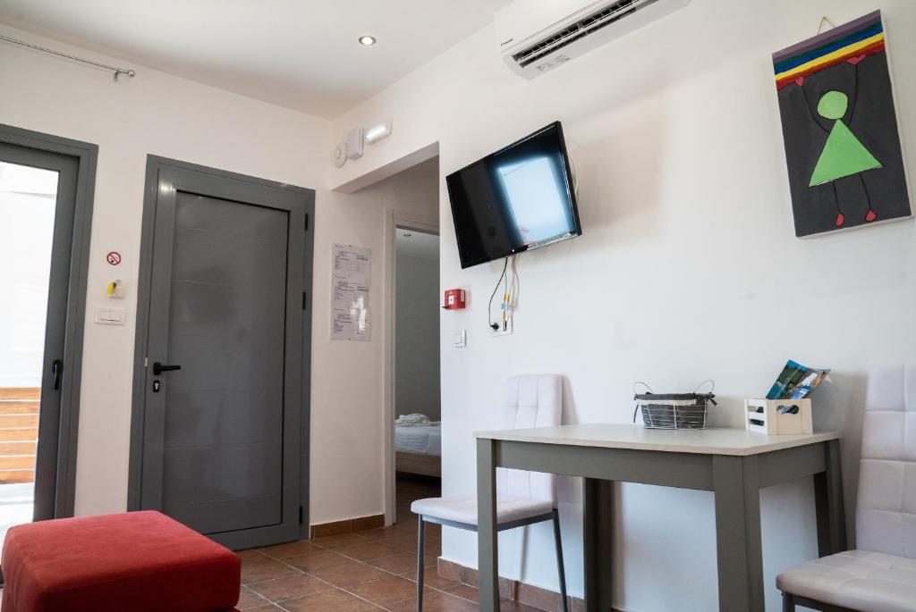 Televízia a/alebo spoločenská miestnosť v ubytovaní Dream Houses