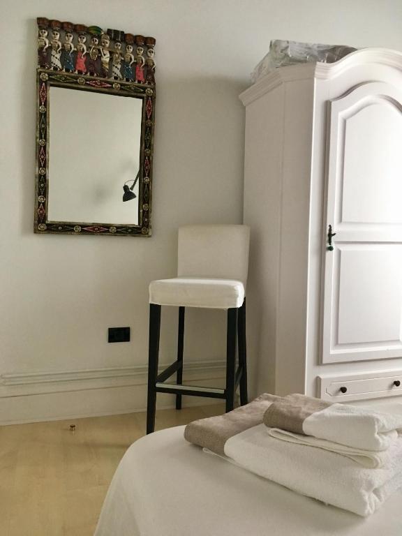 Łóżko lub łóżka w pokoju w obiekcie Apartamento en el centro de Bilbao