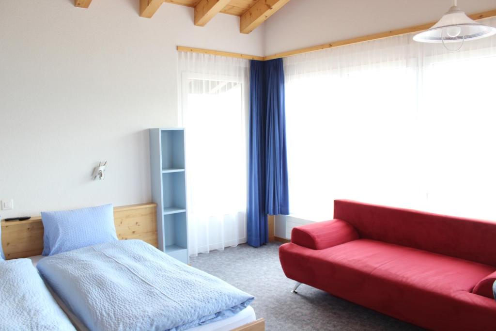 Postel nebo postele na pokoji v ubytování Hotel Alpha