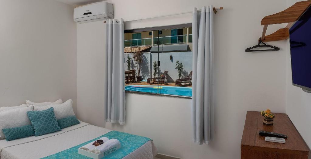 Postel nebo postele na pokoji v ubytování Pousada Lua e Mar