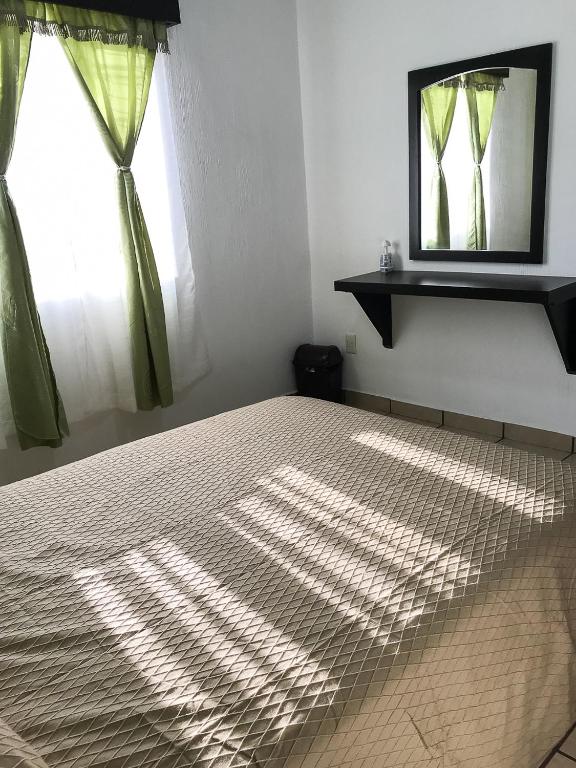 Postel nebo postele na pokoji v ubytování Comodo Departamento