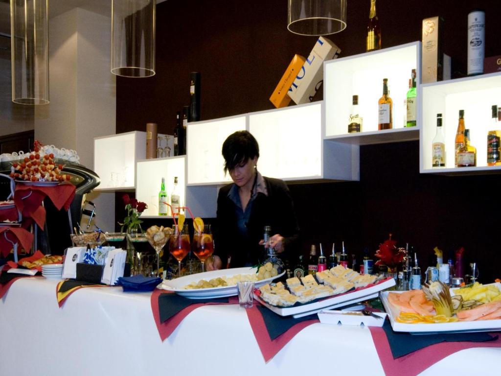 Nápoje v ubytovaní Grand Hotel Mattei