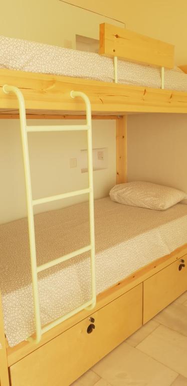 Postel nebo postele na pokoji v ubytování NEX Hostel