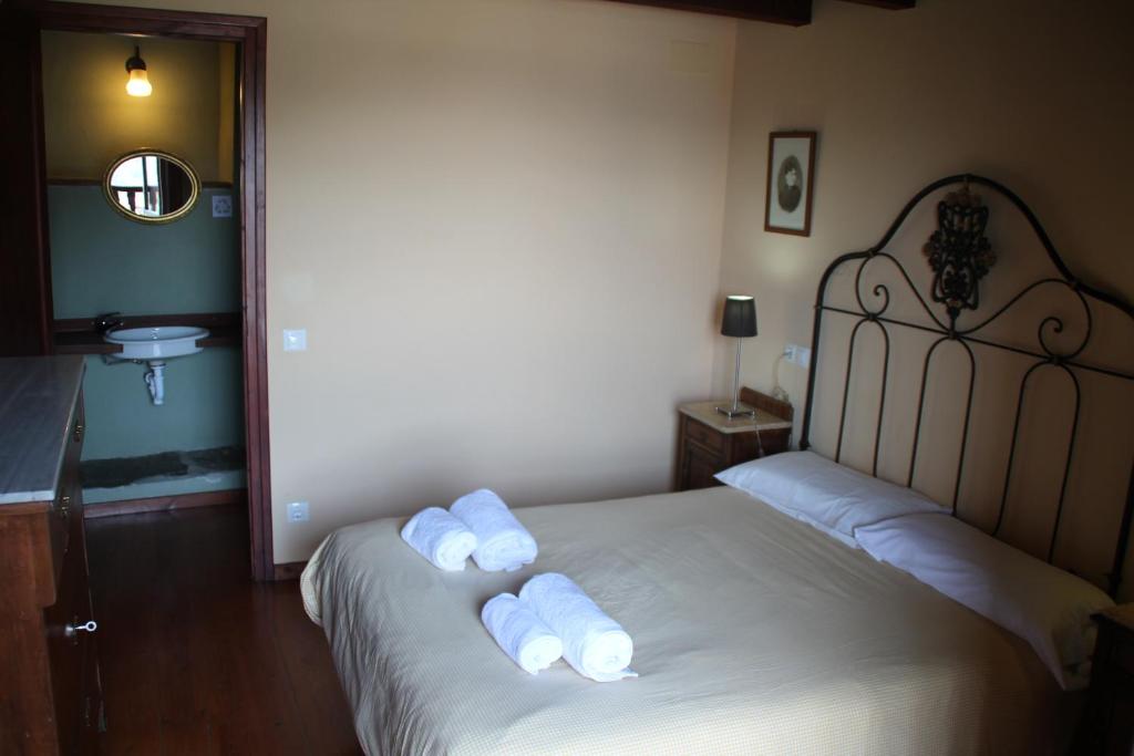 Cama o camas de una habitación en Can Bonada