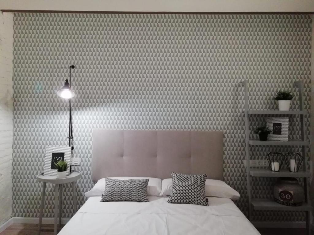 Posteľ alebo postele v izbe v ubytovaní Vestal Suites Classic