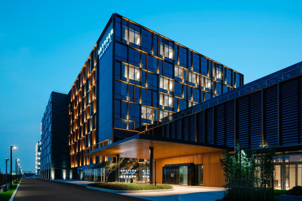 an office building with a black building at Artyzen Habitat Hongqiao Shanghai - Korean Street in Shanghai