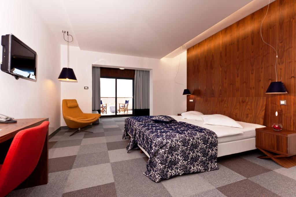 Postel nebo postele na pokoji v ubytování Hotel IN
