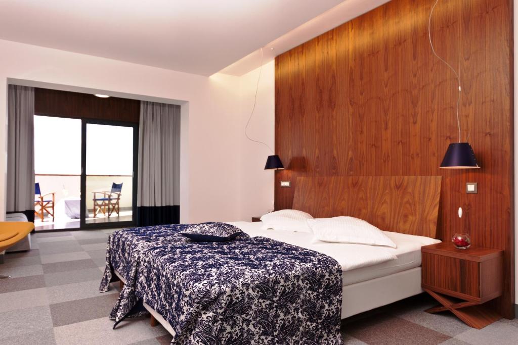 Postel nebo postele na pokoji v ubytování Hotel IN