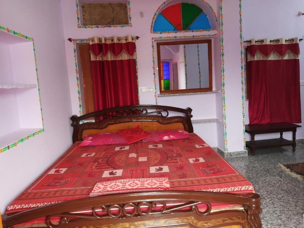 Postel nebo postele na pokoji v ubytování Hotel Paramount Palace
