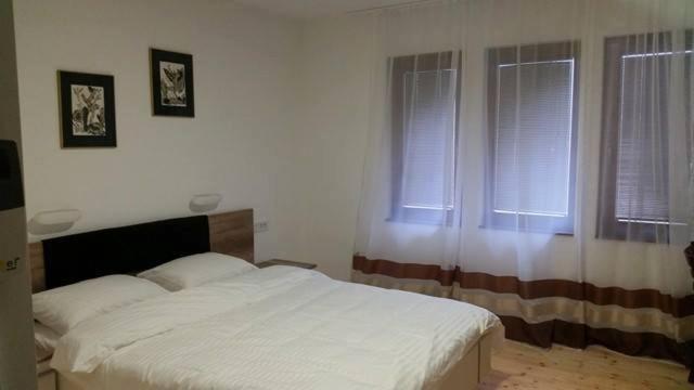 Postel nebo postele na pokoji v ubytování Konak Nestor Bungalows