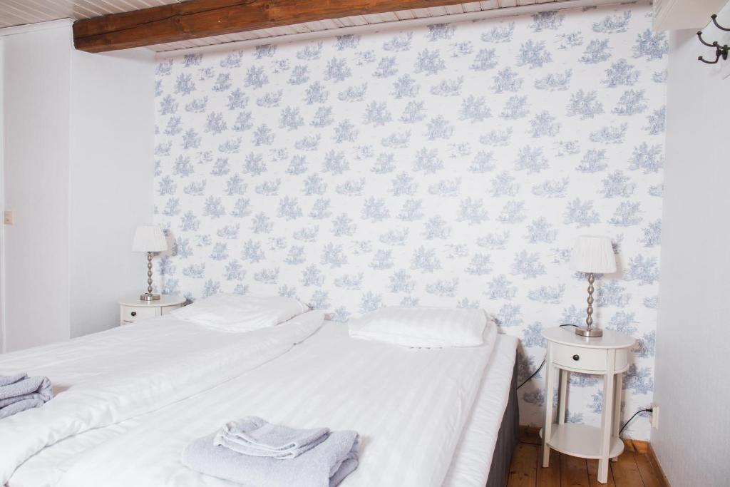 Postel nebo postele na pokoji v ubytování Landet Bed and Breakfast