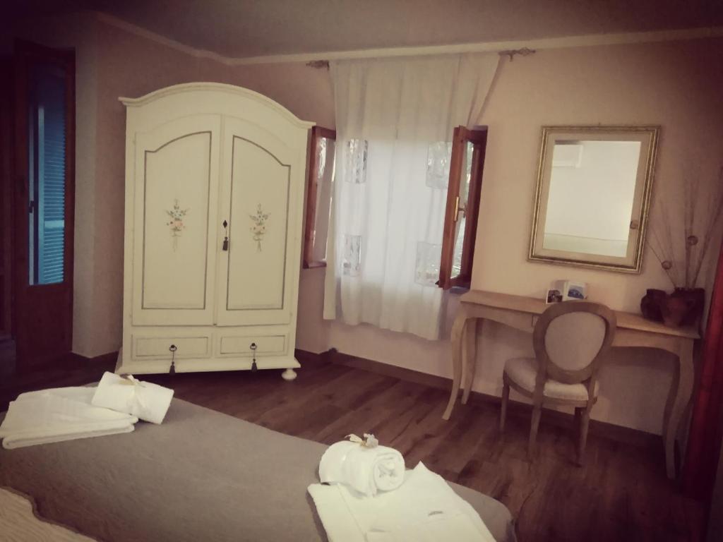 Postel nebo postele na pokoji v ubytování Baia D'Oro