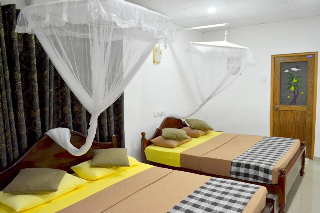 Postel nebo postele na pokoji v ubytování Max Safari Villa