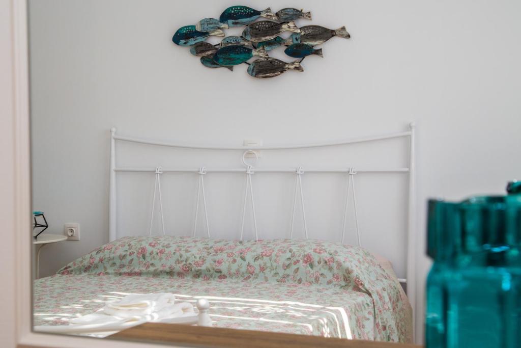 Łóżko lub łóżka w pokoju w obiekcie Sunrise Bay