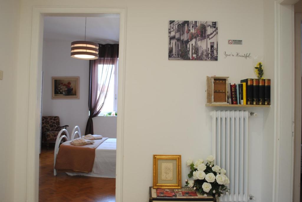 Postel nebo postele na pokoji v ubytování Dreaming Verona Rooms
