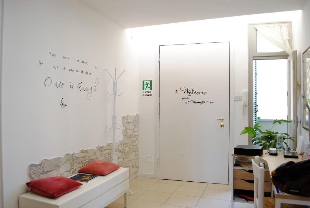 Postel nebo postele na pokoji v ubytování Dreaming Verona Rooms