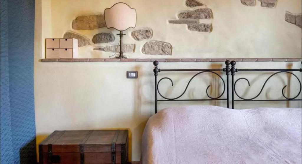 Postel nebo postele na pokoji v ubytování Casa Mazzocchi Vista su Poppi