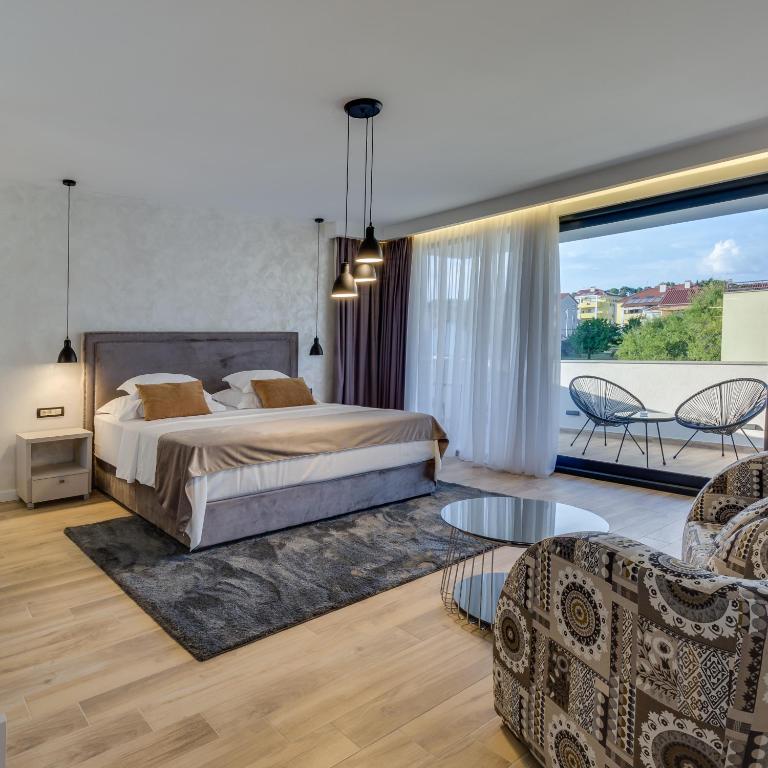 Posteľ alebo postele v izbe v ubytovaní Mirabilis Residence