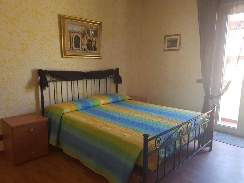 Postel nebo postele na pokoji v ubytování Mirella's House ViaVerona